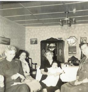Christmas at Grandma's, 1950. Great-aunt Mary and Mom on left. Grandma and me on right,